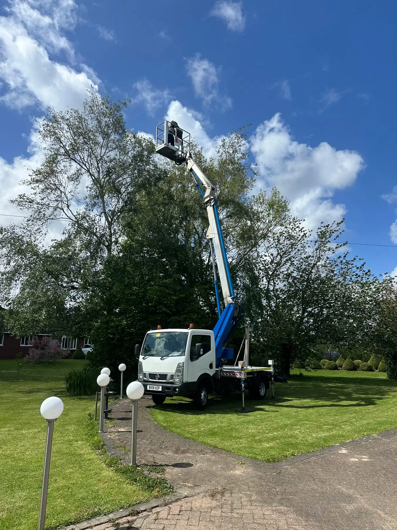 Halton Cherry Picker Hire vehicle-mounted platform with the boom extended