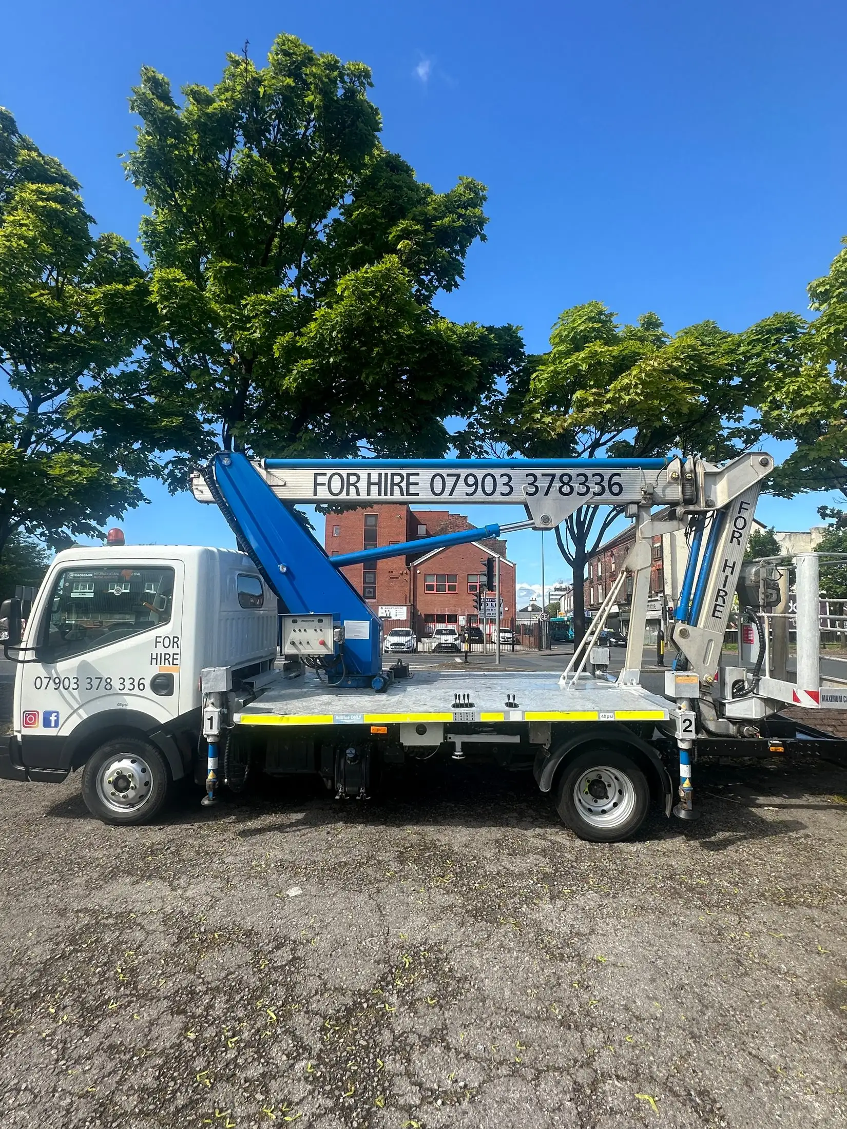 Halton Cherry Picker Hire branded vehicle with the contact phone number on the boom