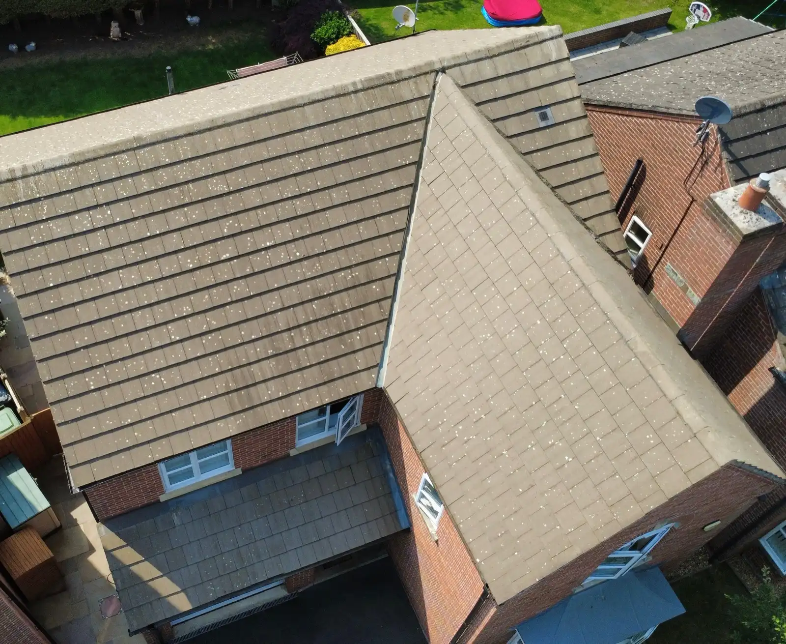 The same roof after we scraped and brushed the moss off