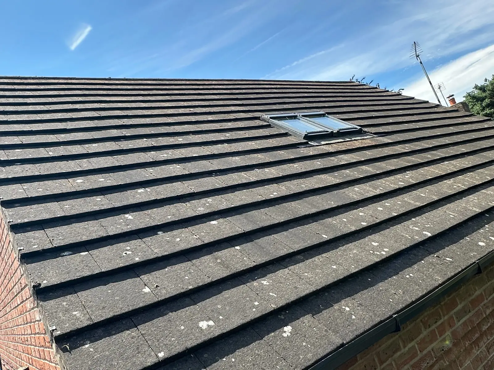 A roof left clean and clear of moss after cleaning from the platform